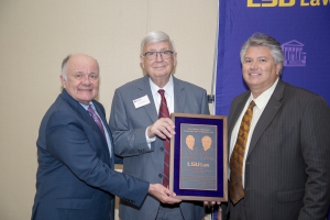 LSU Law Dean Tom Galligan, Richard “Jerry” Dodson, and Kenny Hooks commemorate the Dodson & Hooks Endowed Chair in Maritime Law in 2019. 