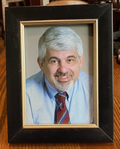 A portrait of the late Carey J. Messina ('78) that sits in the kitchen of the home he shared with his wife Jolie.