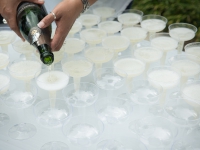 Champagne is poured into cups