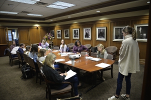 Middle District of Louisiana Magistrate Judge Erin Wilder-Doomes ('99), center, listens along with students as a presentation is given during her Exploring the Role of the Magistrate class