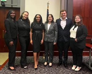 Fall 2023 Flory Mock Trial Competition champions Caidyn Thompson and Anada Sherwood-Saul (left to right) with Judge Tiffany Foxworth-Roberts, Kyla Romanach, Jacob Lester, and Summer Knight. 