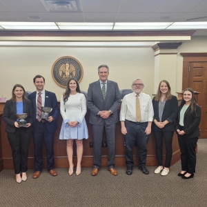 2023 Robert Lee Tullis Moot Court Competition winners Victoria Vicknair and Andrew Levie (from left to right) with Breazeale, Sachse & Wilson Partner Danielle Borel (’14), Judge Hunter Greene of the Louisiana First Circuit Court of Appeal, LSU Law Professor John Devlin, and competition runners up Hannah Johnson and Emily Cormier. 