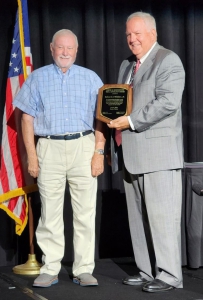 The Hon. John Davidson (’88), right, presents Ed Walters Jr. (’75) with the 2024 Louisiana Bar Foundation’s Curtis R. Boisfontaine Trial Advocacy Award at the Louisiana State Bar Association General Assembly in Destin, Florida on June 6.
